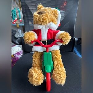 Avon 1997 Christmas Cycling Teddy Bear Santa: Plays music & moves (TC041)